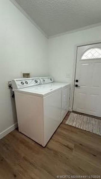 16537 Southwest Two Wood Way Indiantown, FL 34956 - Photo 4 of 14 a utility room with washer and dryer