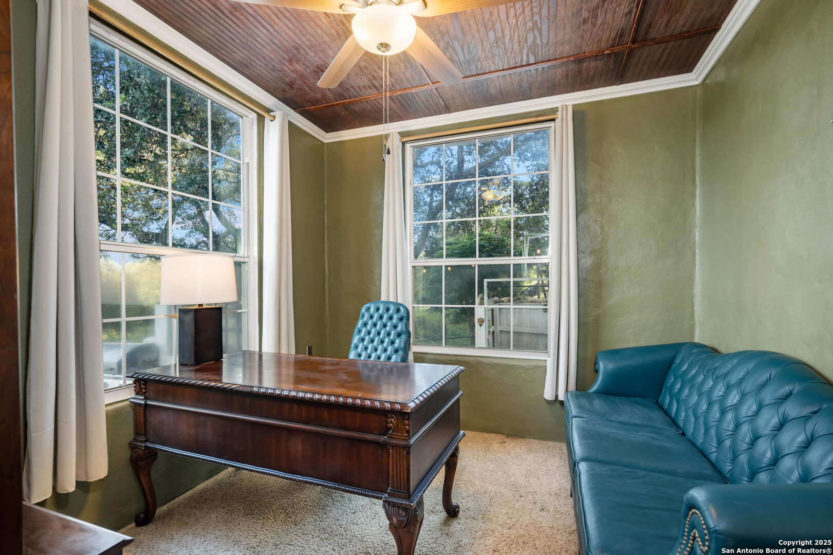 10655 Rebecca Creek Road Spring Branch, TX 78070 - Photo 13 of 34 a living room with furniture and a window