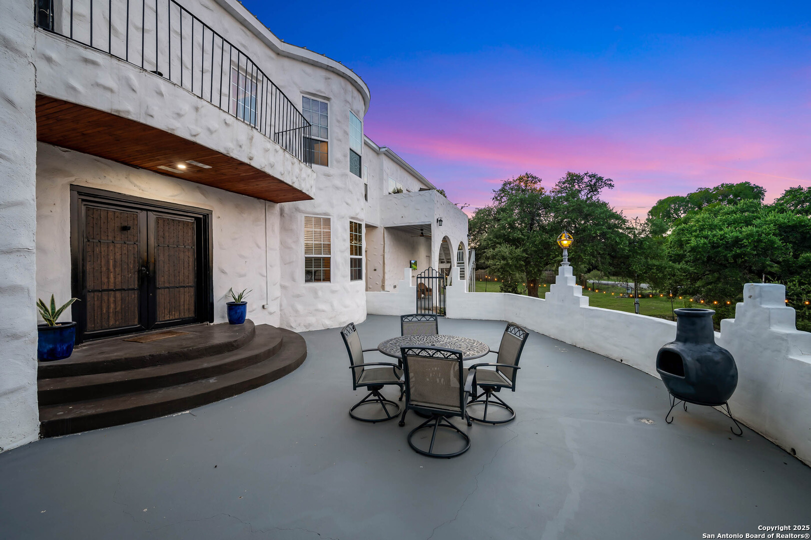 10655 Rebecca Creek Road Spring Branch, TX 78070 - Photo 27 of 34 a building outdoor space with patio furniture and potted plants