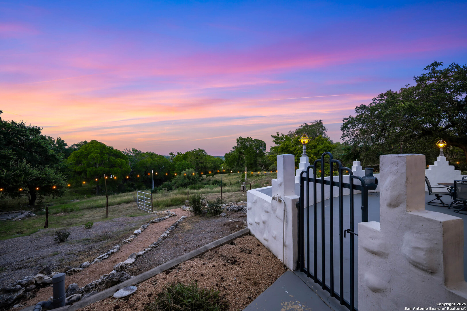10655 Rebecca Creek Road Spring Branch, TX 78070 - Photo 29 of 34 a view of a deck with a big yard