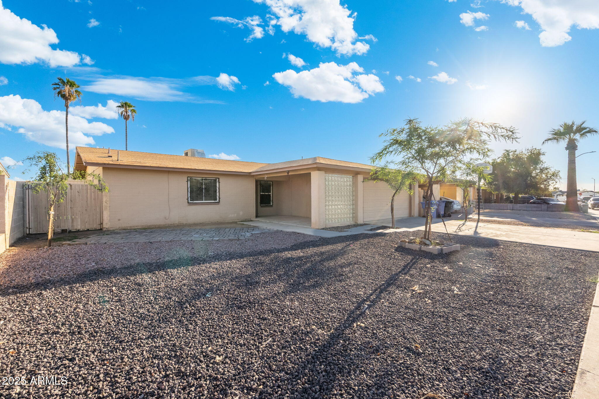 1121 West Halstead Drive Phoenix, AZ 85023 - Photo 2 of 22 a view of a house with a backyard