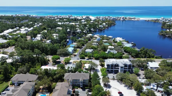 an aerial view of a house with a lake view