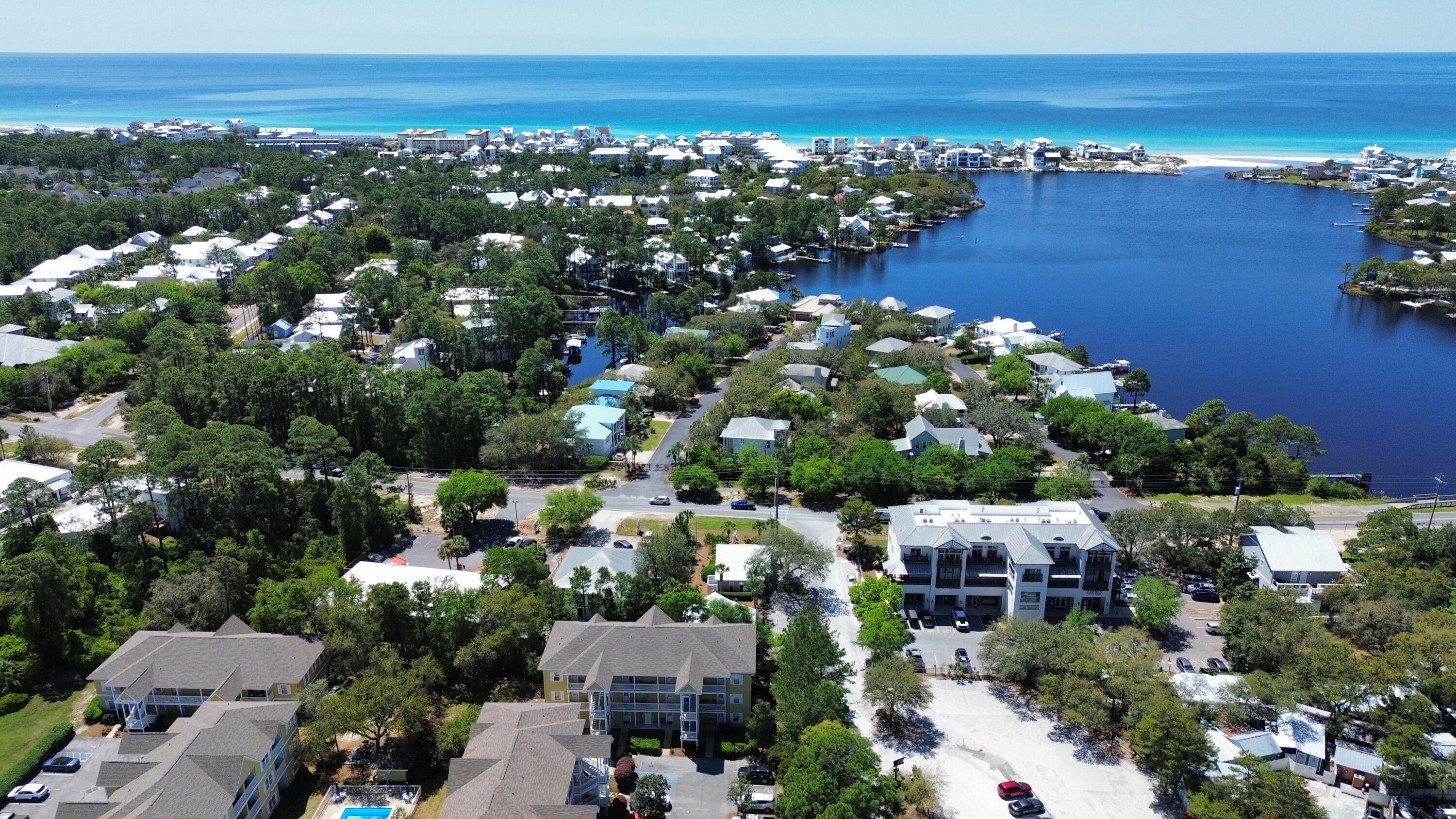 34 Heron's Watch Way, Unit 6104 Santa Rosa Beach, FL 32459 - Photo 3 of 8 an aerial view of a house with a lake view
