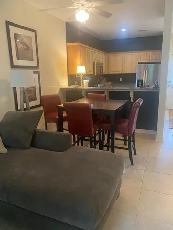a view of a dining room with furniture