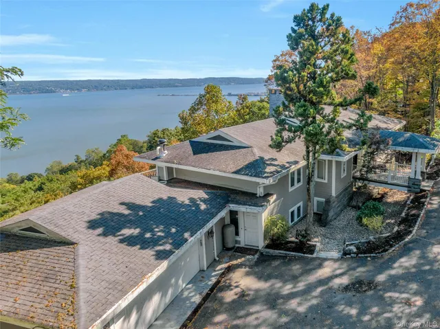a view of a house with a ocean view