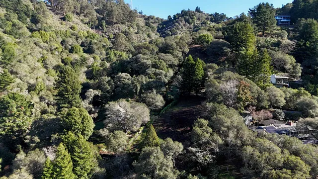 a view of a house in a field