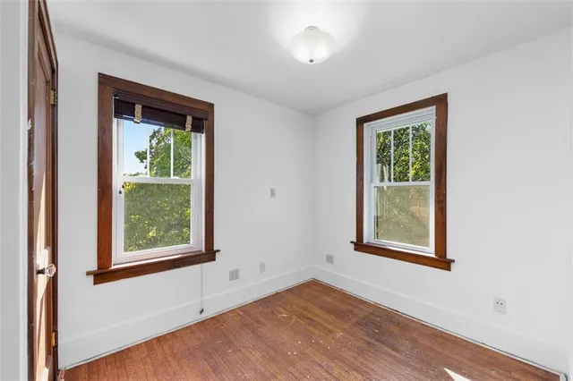 an empty room with windows