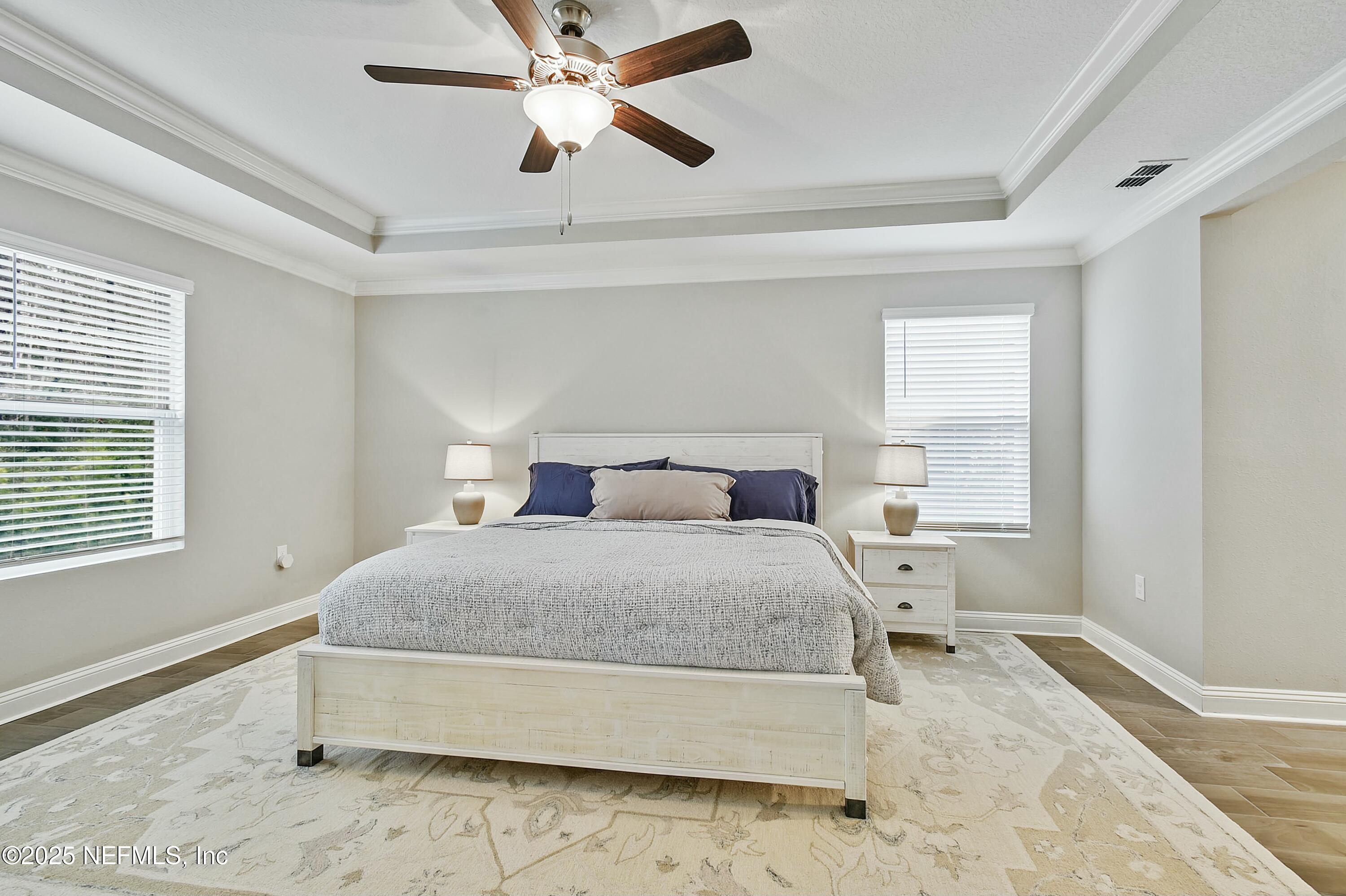 1399 Parkland Trail St. Augustine, FL 32095 - Photo 15 of 39 a bedroom with a bed and a window