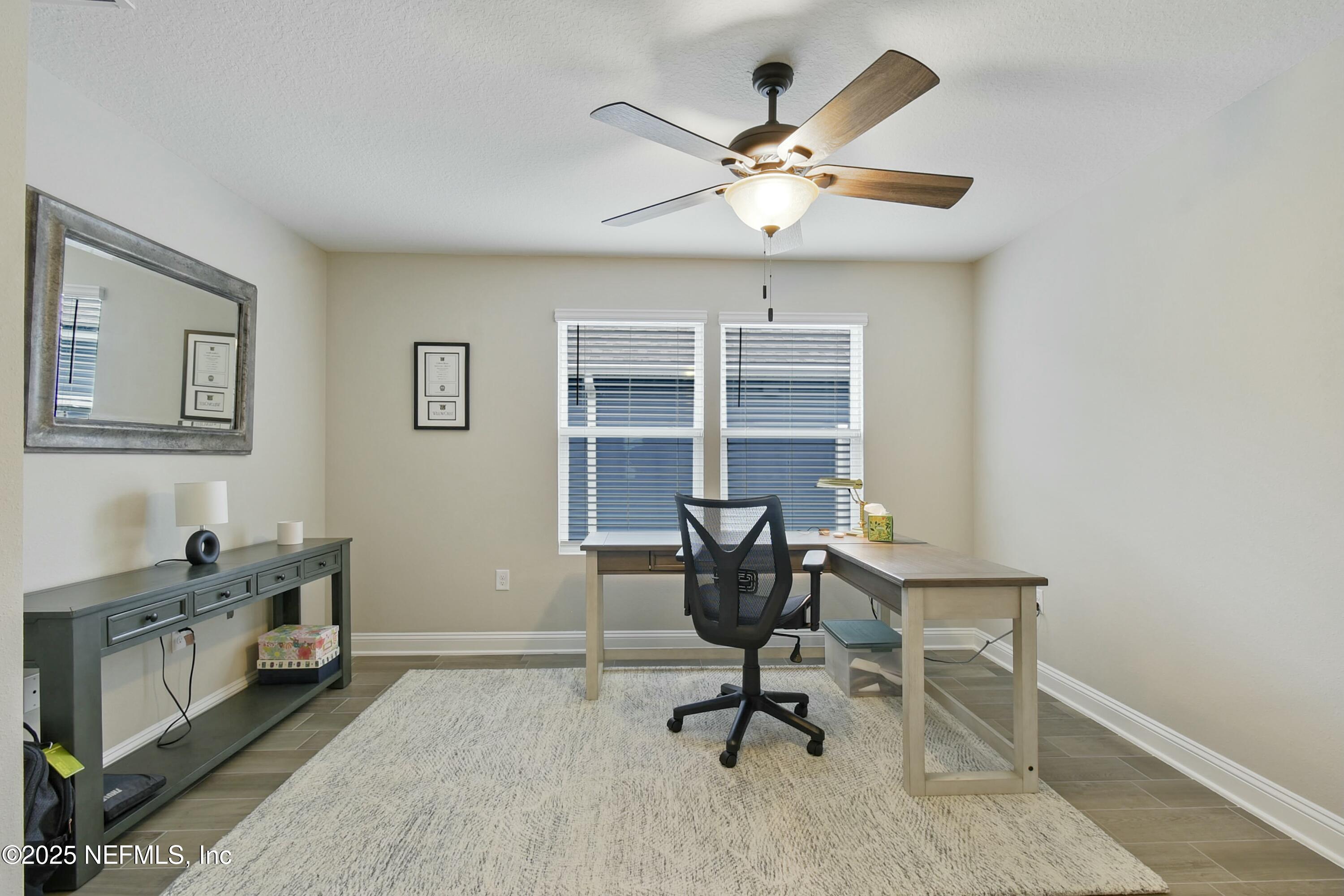 1399 Parkland Trail St. Augustine, FL 32095 - Photo 23 of 39 a view of a workspace with furniture