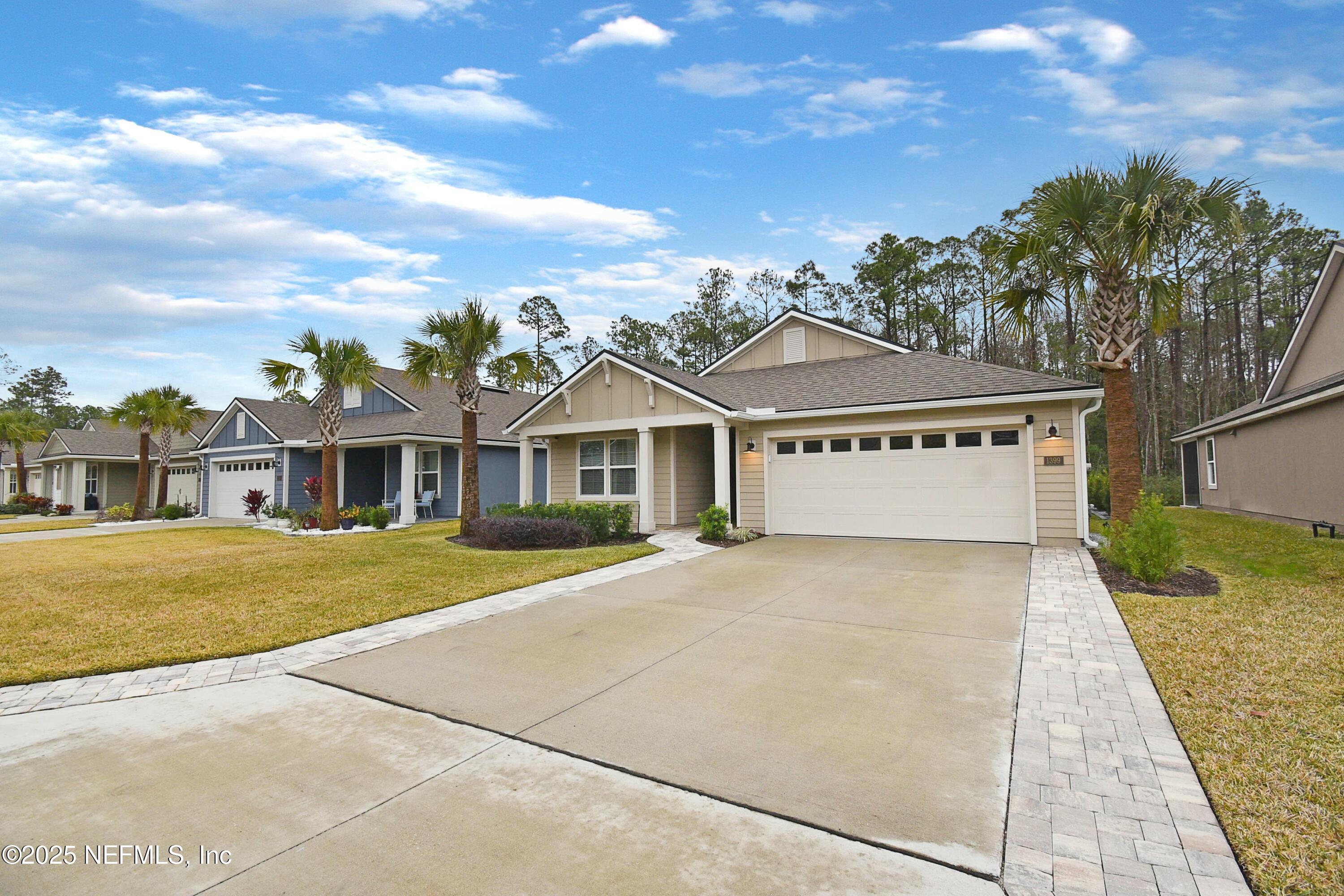 1399 Parkland Trail St. Augustine, FL 32095 - Photo 31 of 39 front view of house with a yard