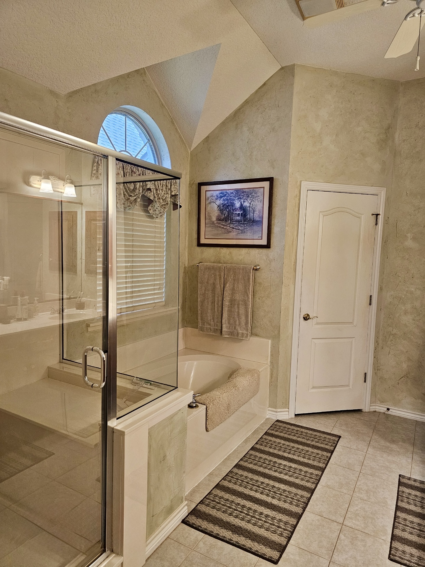 101 Texas Traditions Georgetown, TX 78628 - Photo 15 of 17 a view of a bathroom with a tub and shower