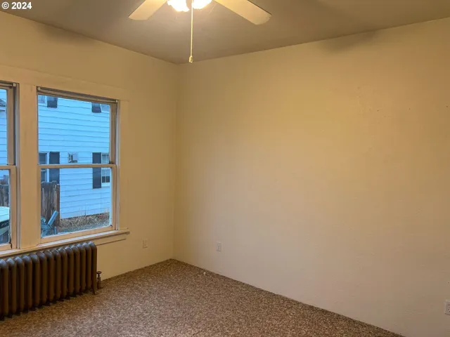 an empty room with a window