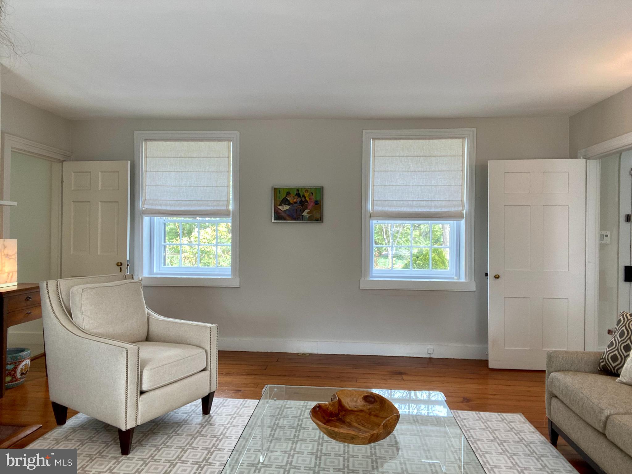 121 Upnor Road Baltimore, MD 21212 - Photo 43 of 79 a living room with furniture and a window