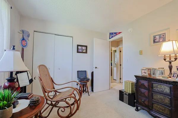 a view of a workspace with furniture and toys