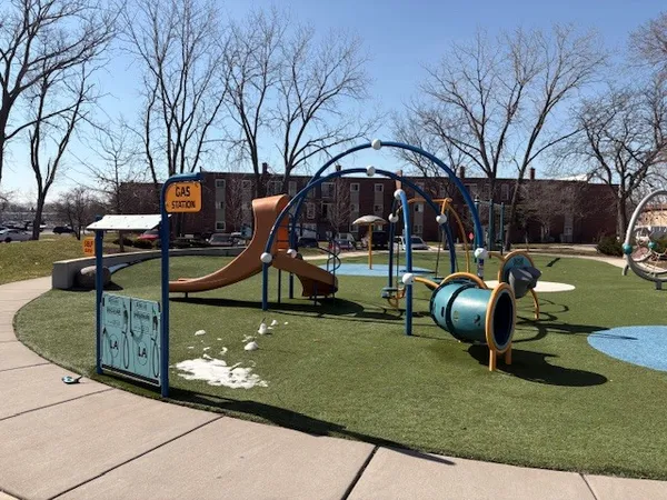 a view of a park with slide