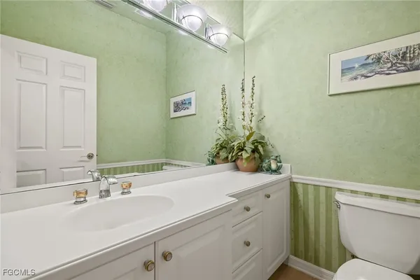 a bathroom with a sink and a toilet