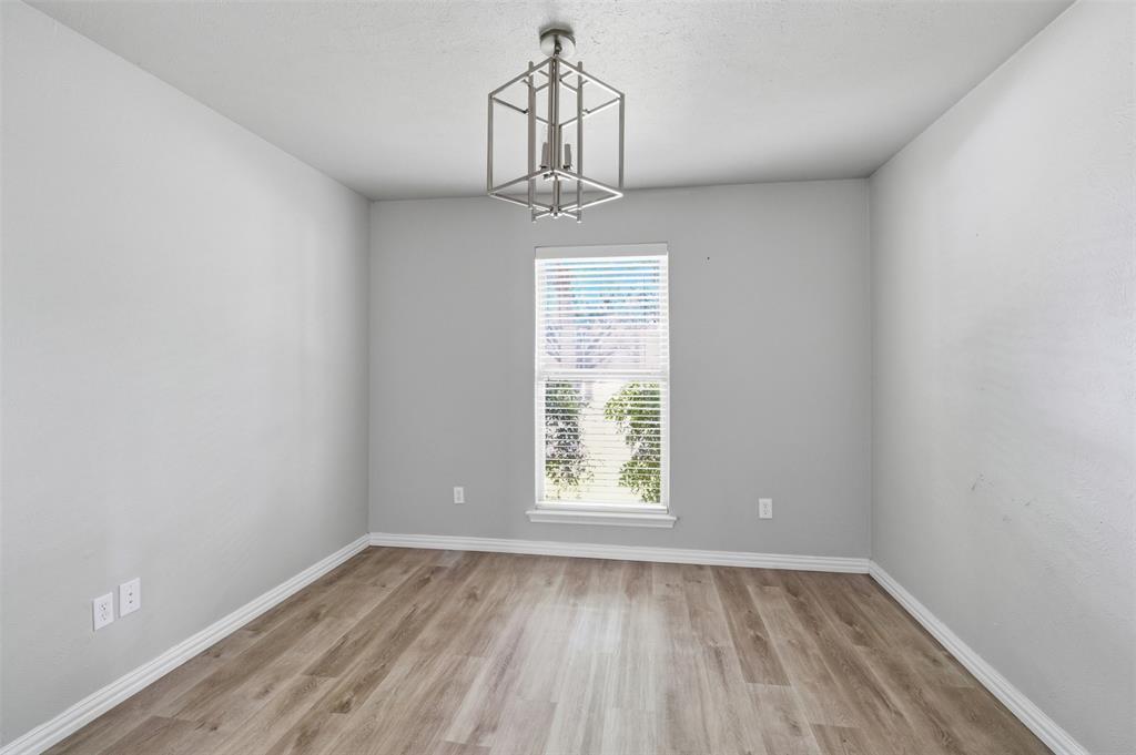 3712 Cemetery Hill Road Carrollton, TX 75007 - Photo 10 of 25 an empty room that has a window