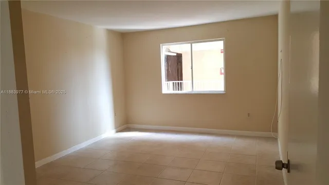 an empty room with a window