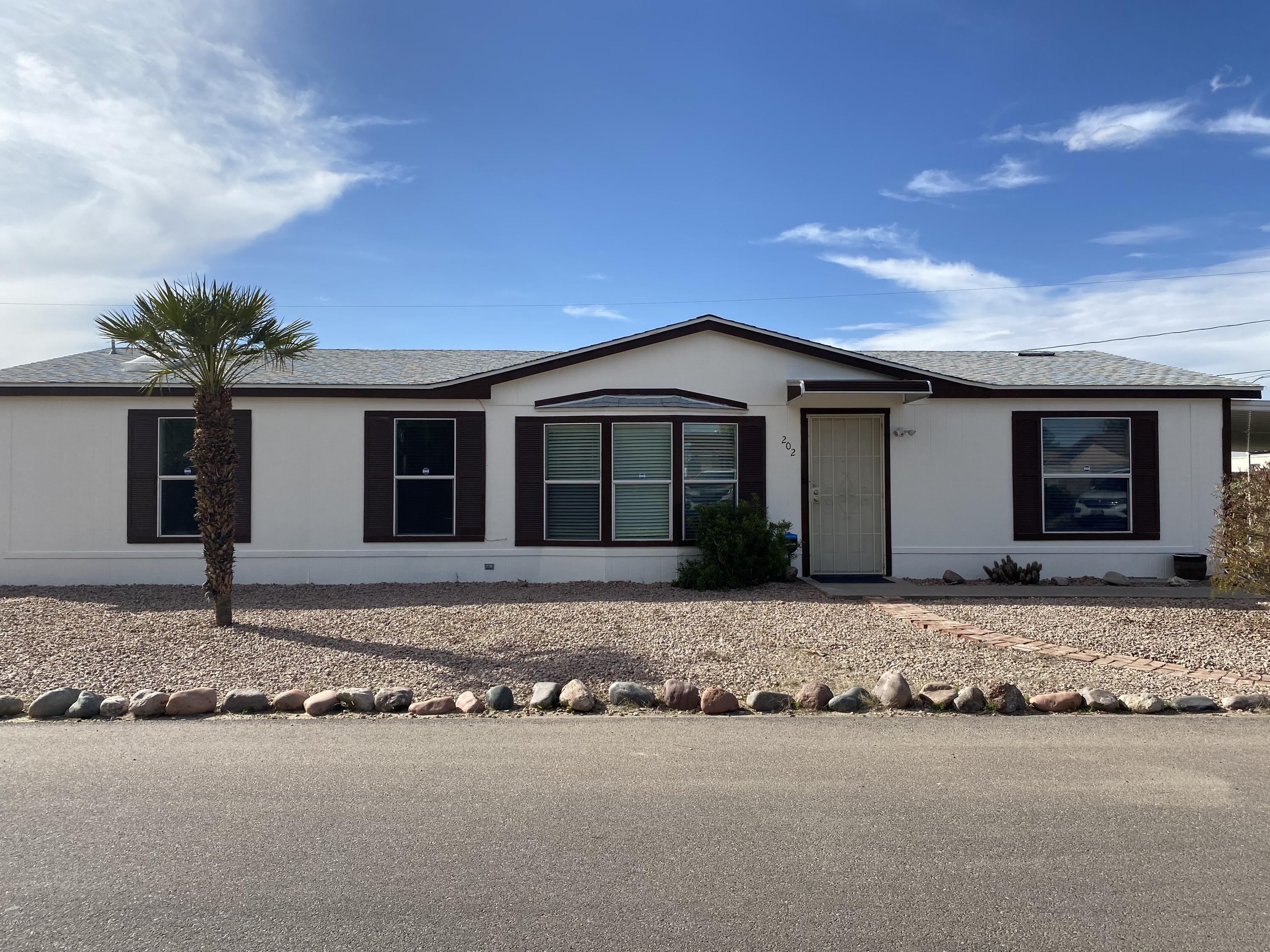 202 North Hawes Road Mesa, AZ 85207 - Photo 1 of 27 front view of a house with a sink and a window
