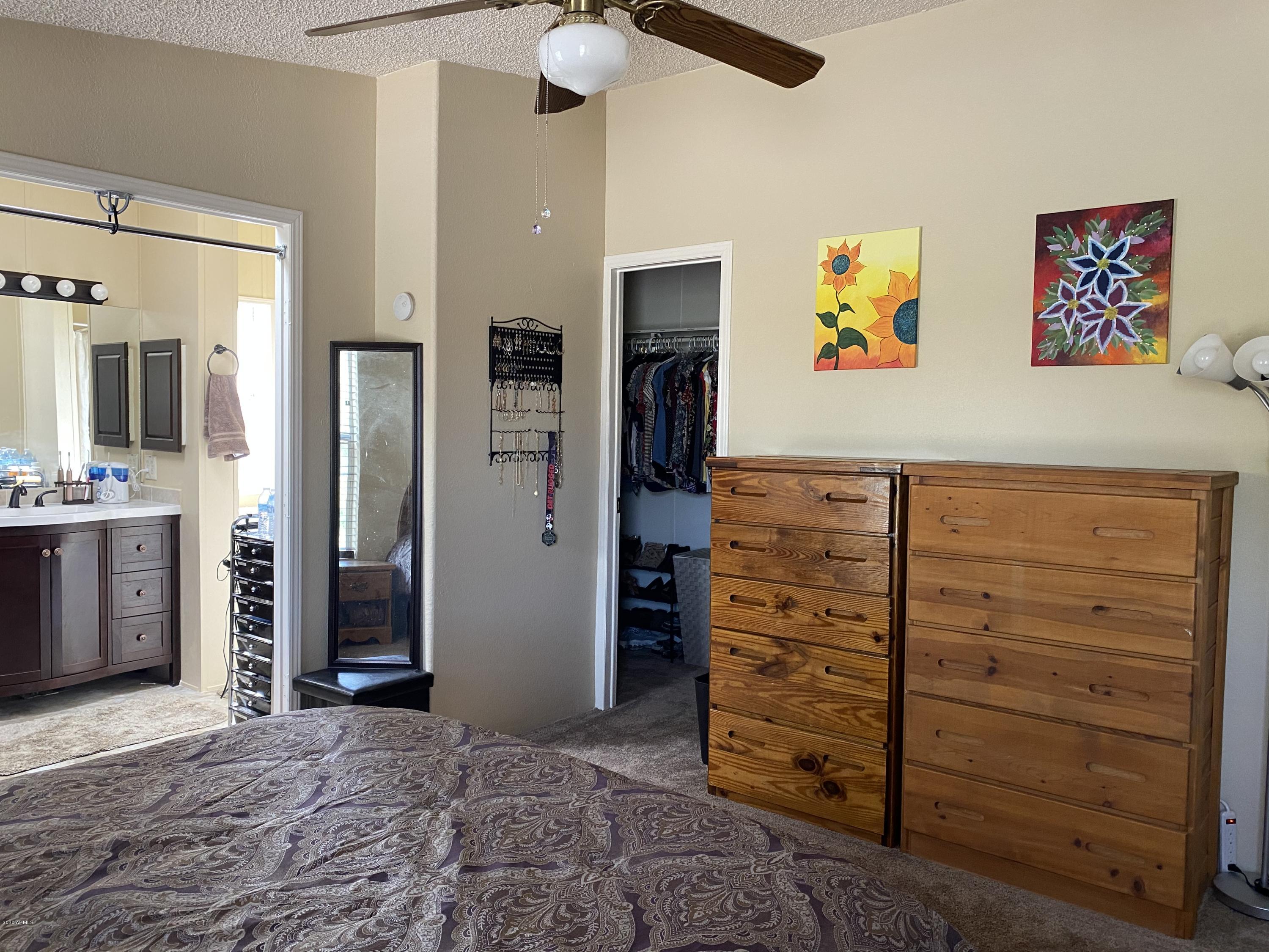 202 North Hawes Road Mesa, AZ 85207 - Photo 15 of 27 a view of walk in closet