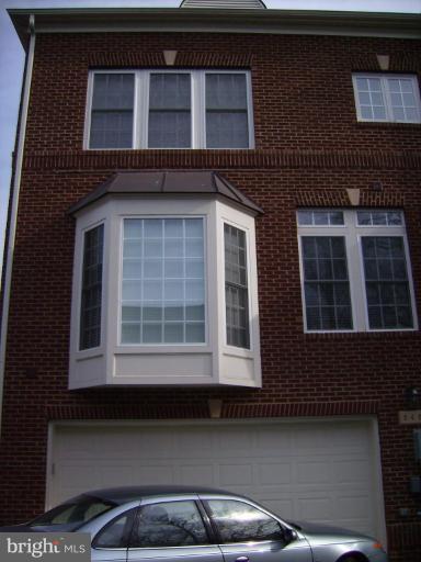 848 West Glebe Road Alexandria, VA 22305 - Photo 5 of 18 a front view of a house with parking