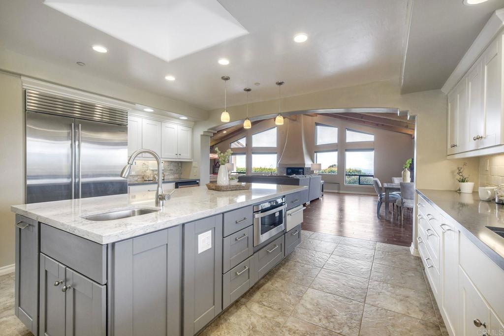 13590 Anthony Ridge Road Valley Center, CA 92082 - Photo 1 of 1 a kitchen with counter top space sink and appliances