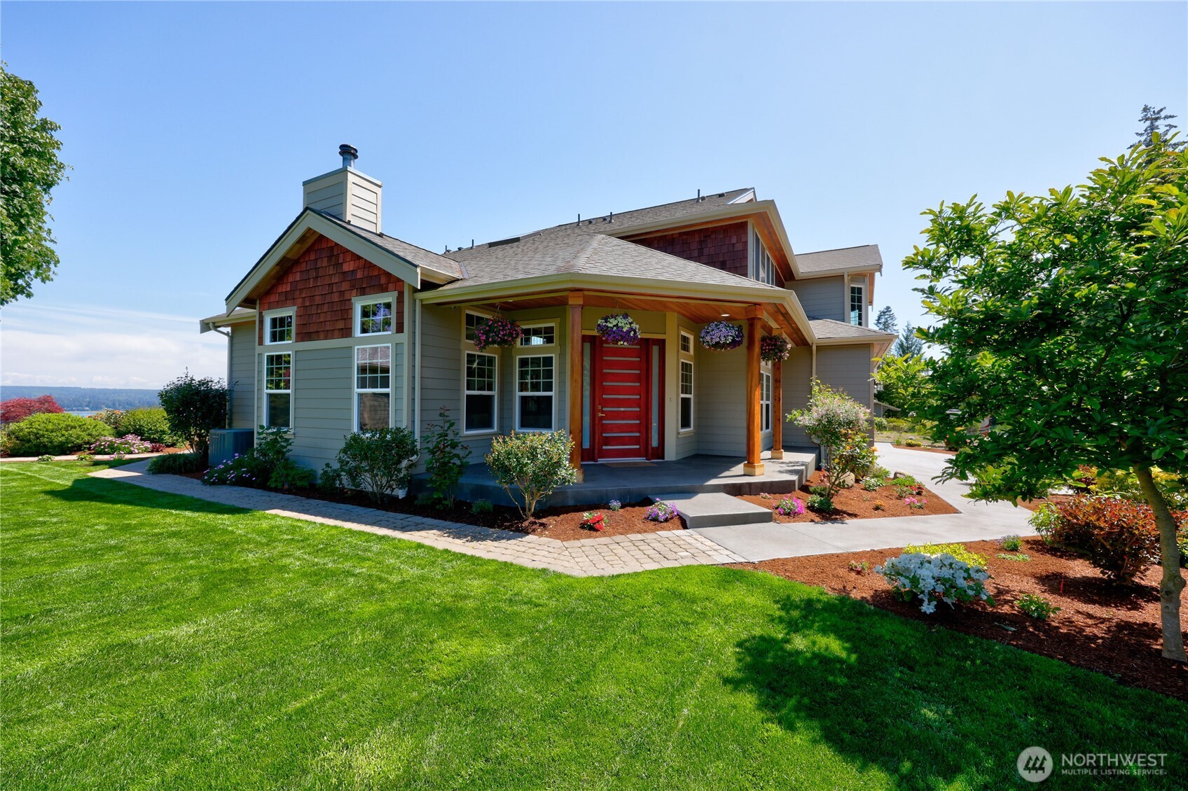 1411 Thorndyke Road Port Ludlow, WA 98365 - Photo 6 of 40 a view of a house with backyard and porch