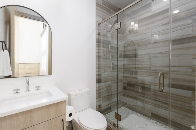 160 Ridgeview Street, Unit 7B Brian Head, UT 84719 - Photo 22 of 40 En-suite bathroom featuring vanity and a stall shower