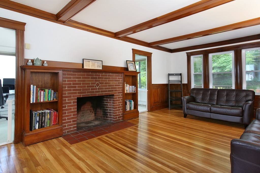 37 Stuart Road Newton, MA 02459 - Photo 4 of 10 a living room with furniture and a fireplace