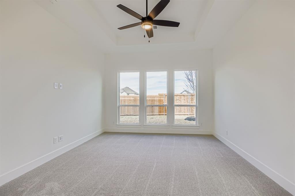 2608 Cedar Rdg Road Celina, TX 75009 - Photo 13 of 29 an empty room with a window and a fan