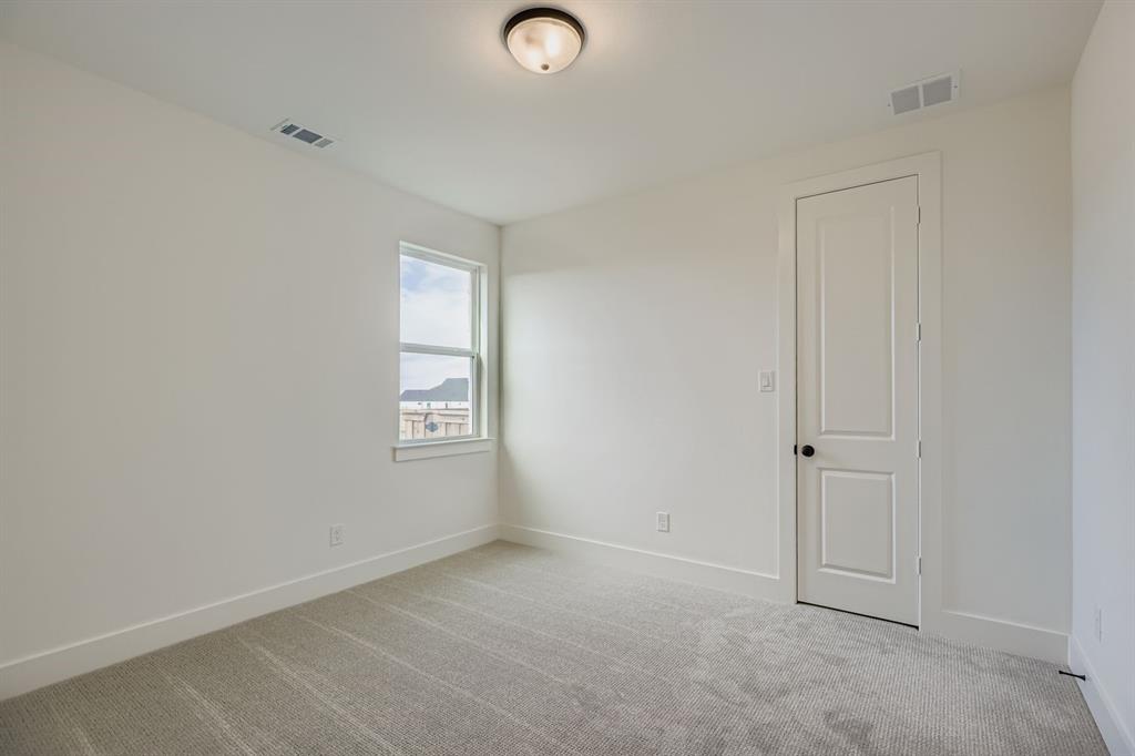 2608 Cedar Rdg Road Celina, TX 75009 - Photo 17 of 29 an empty room with windows