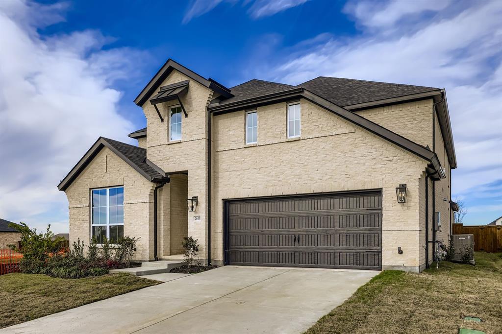 2608 Cedar Rdg Road Celina, TX 75009 - Photo 2 of 29 a front view of a house with a yard