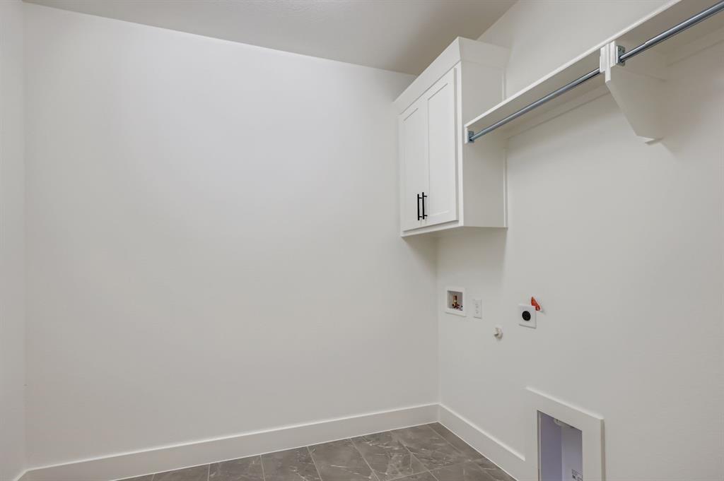 2608 Cedar Rdg Road Celina, TX 75009 - Photo 25 of 29 a view of small space with racks on the wall