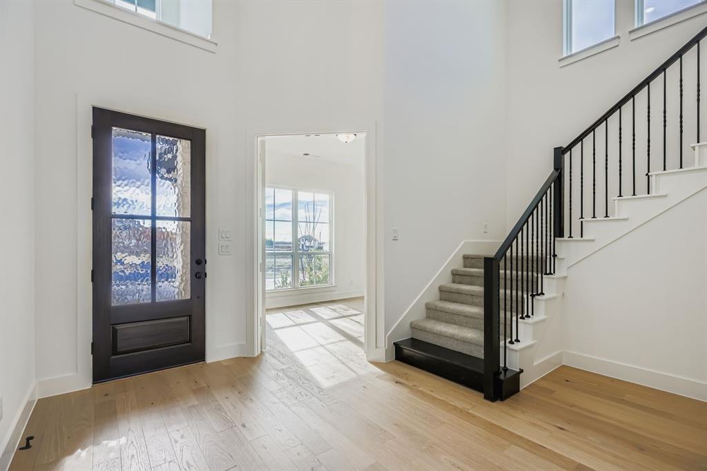 2608 Cedar Rdg Road Celina, TX 75009 - Photo 4 of 29 a view of entryway and hall with wooden floor