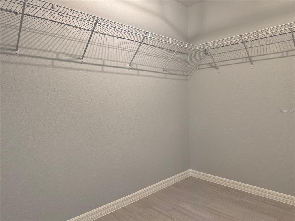 2 Locust Loop Drive Ocala, FL 34472 - Photo 8 of 12 a view of a room with racks on the wall