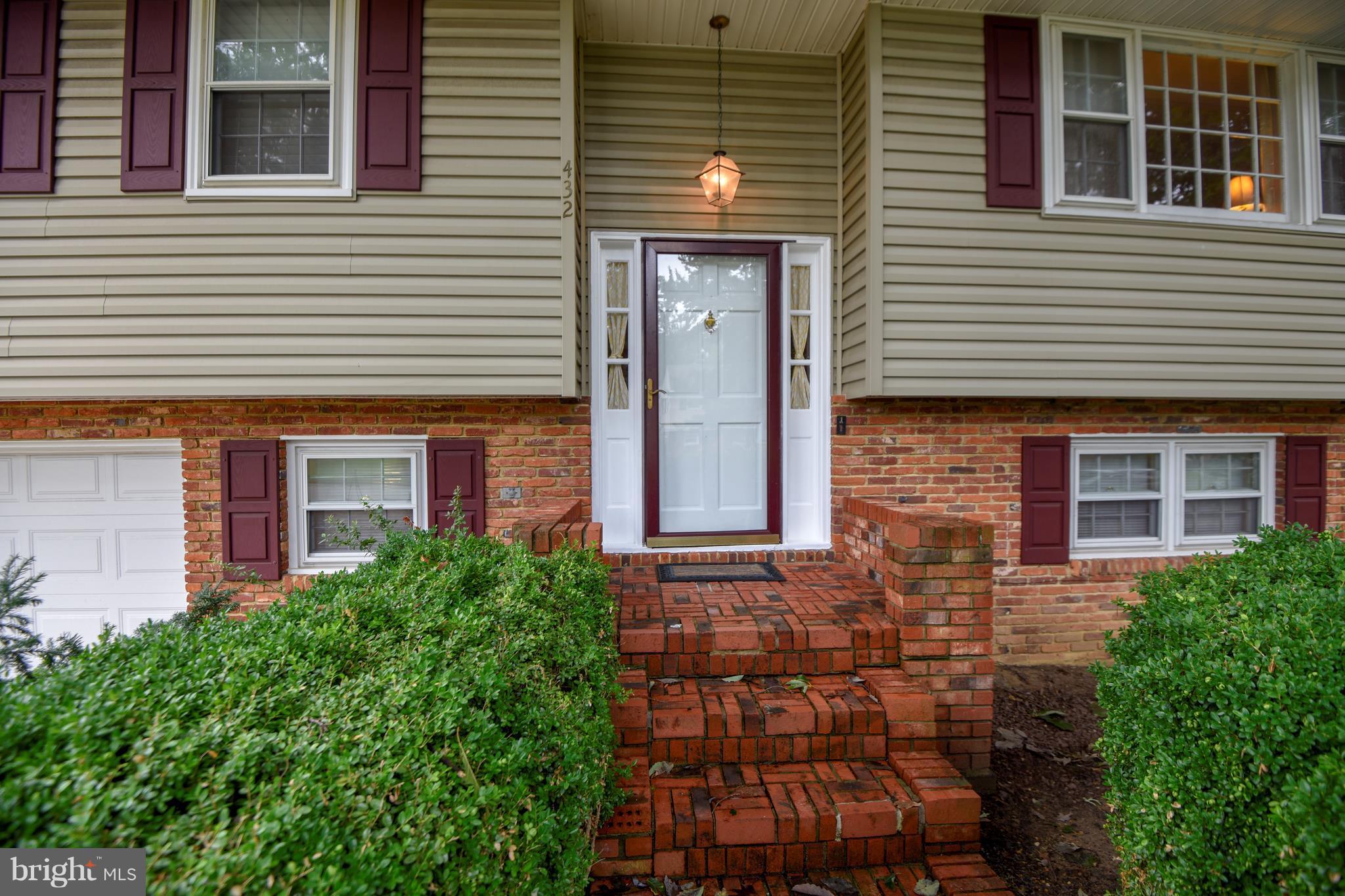 432 Ruth Road Arnold, MD 21012 - Photo 14 of 56 Brick Steps frame winding walk way-1 car garage