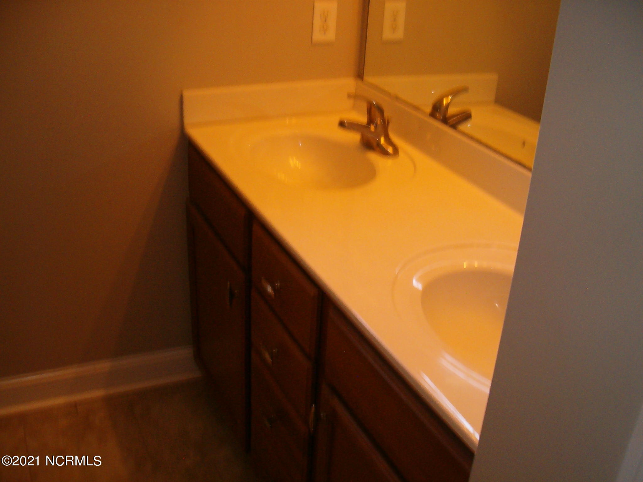 209 Oak Ridge Lane Holly Ridge, NC 28445 - Photo 11 of 21 Dual sinks bathroom 2