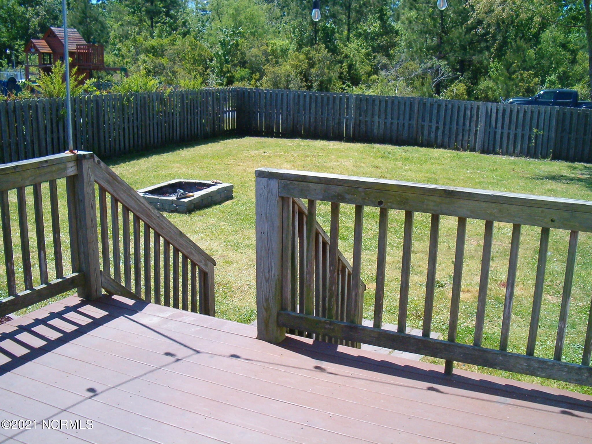 209 Oak Ridge Lane Holly Ridge, NC 28445 - Photo 16 of 21 Trex covered rear deck