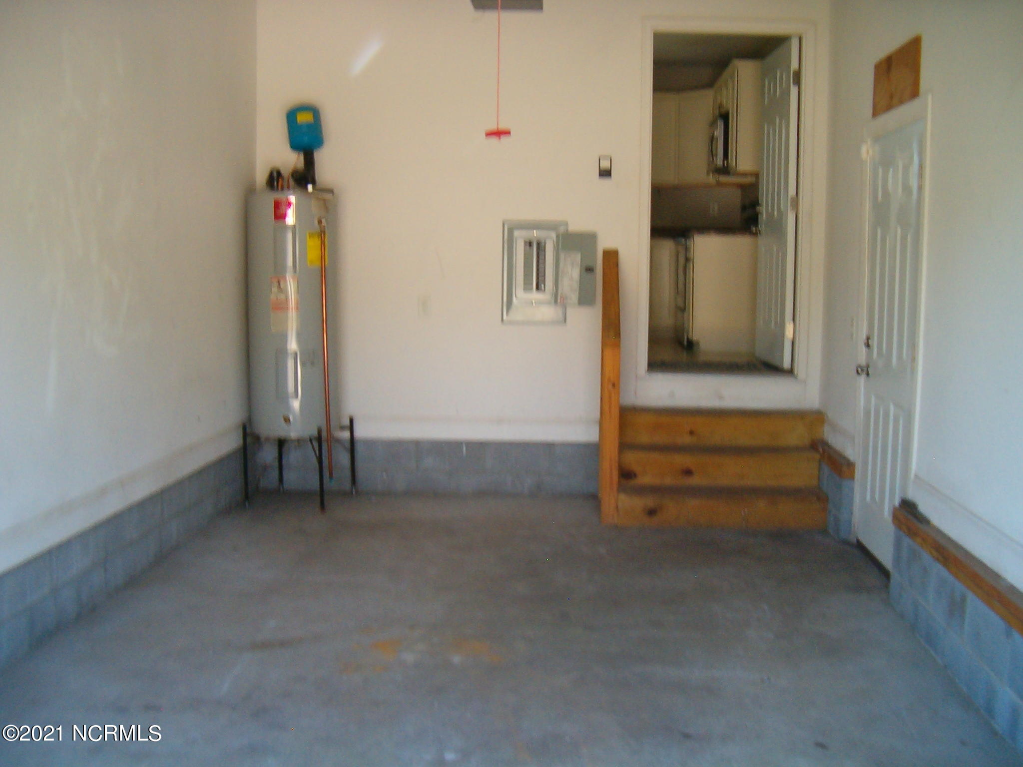 209 Oak Ridge Lane Holly Ridge, NC 28445 - Photo 9 of 21 Garage