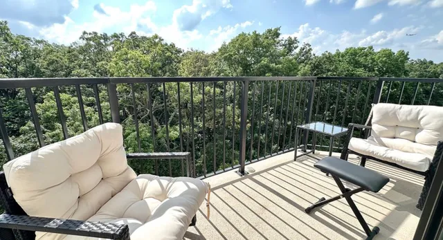 a view of a garage with car parked