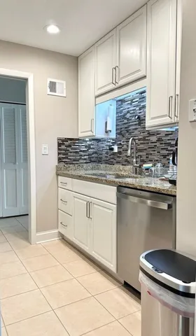 a kitchen with a cabinets and counter space