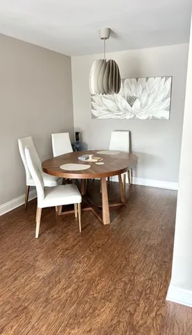 a bed room with a bed window and a chair