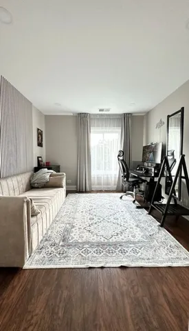 a bathroom with a granite countertop sink mirror and shower