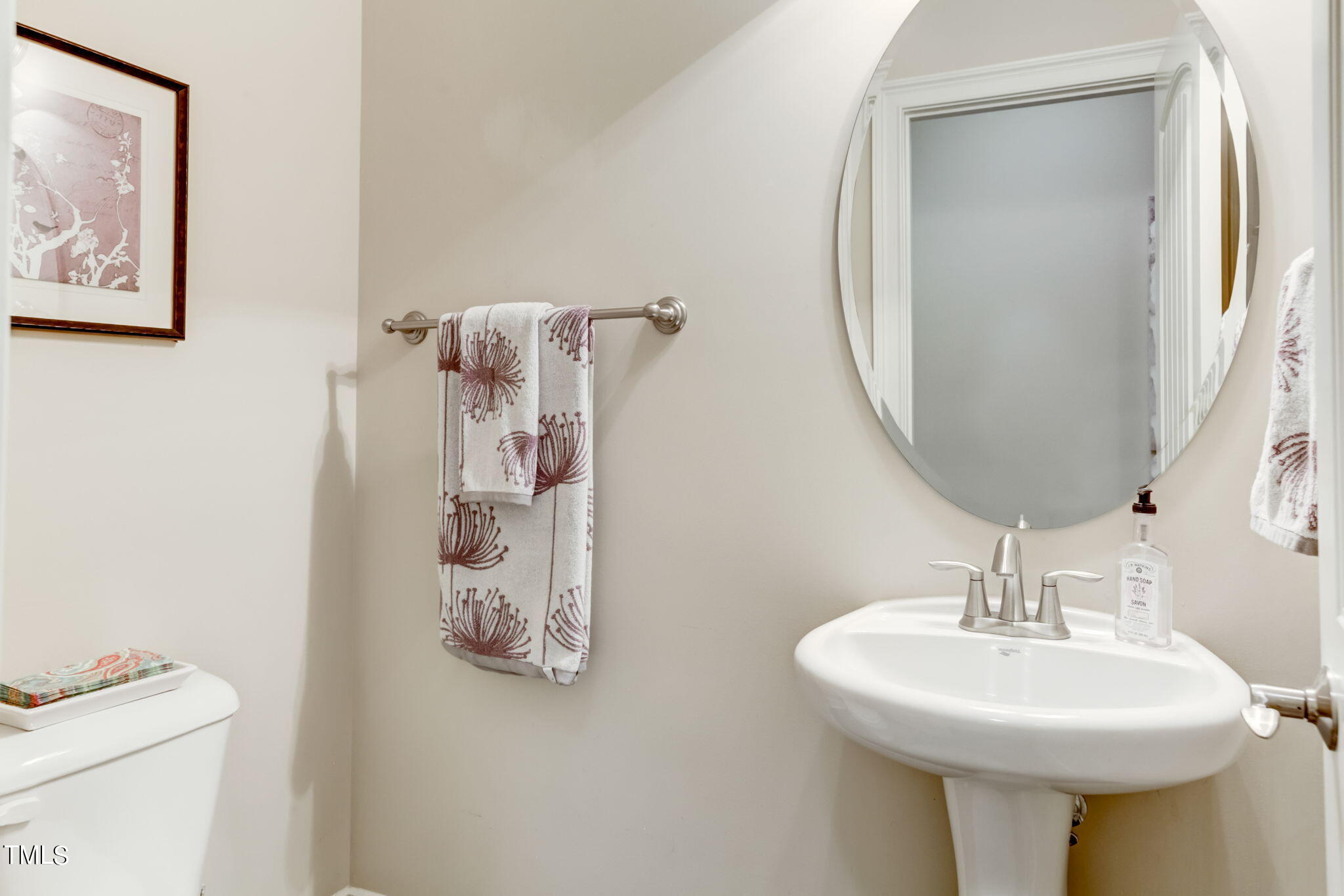 12901 Baybriar Drive Raleigh, NC 27613 - Photo 34 of 41 a bathroom with a sink a mirror and vanity