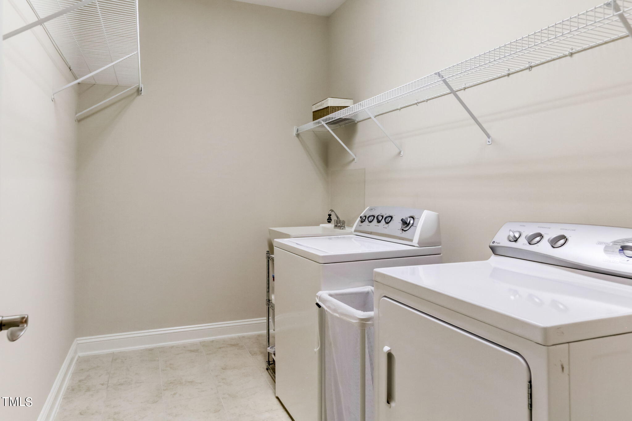 12901 Baybriar Drive Raleigh, NC 27613 - Photo 35 of 41 a utility room with dryer and washer