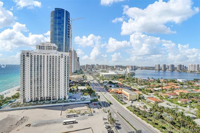 a view of a city with tall buildings