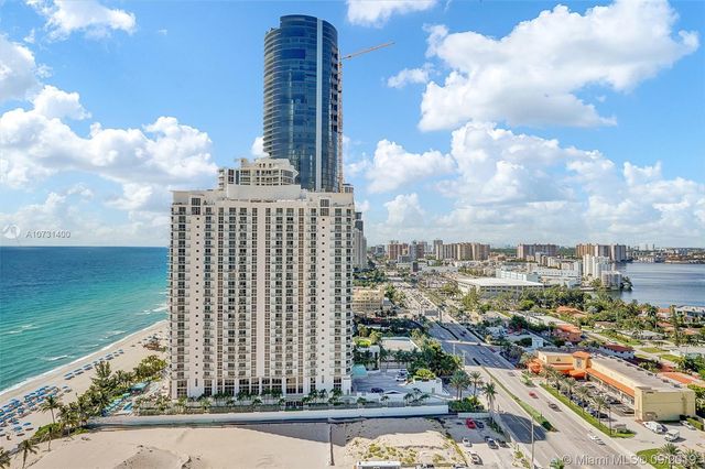a view of a city with tall buildings