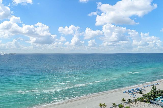a view of yard with ocean view