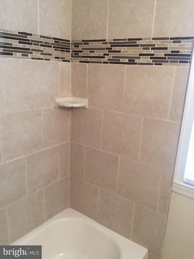 304 Arden Road West Baltimore, MD 21225 - Photo 7 of 30 a bathroom with a shower