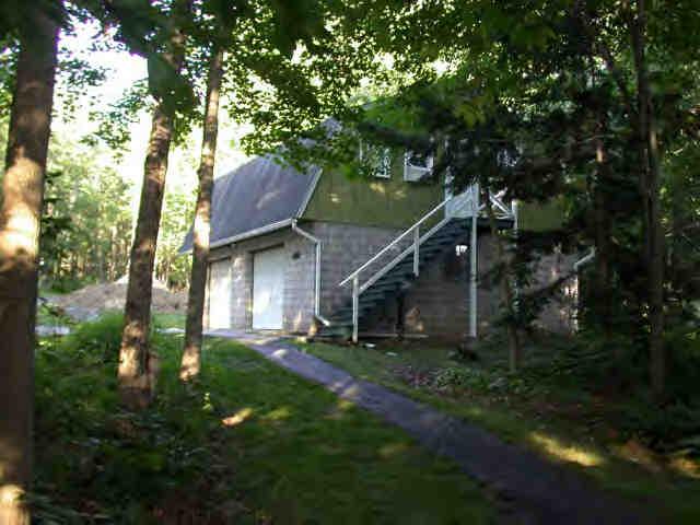 907 Algerie Road Otis, MA 01029 - Photo 6 of 8 a pathway of a house with a yard